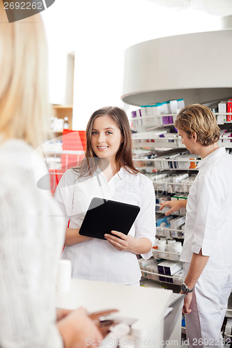 Image of Pharmacist With Digital Tablet