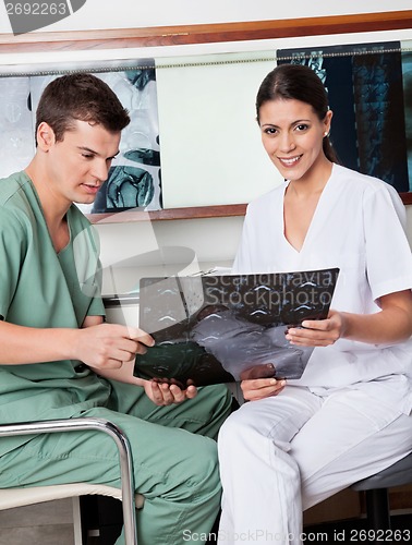 Image of Medical Technicians Analyzing MRI X-ray