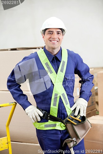 Image of Confident Foreman In Protective Clothing Standing At Warehouse