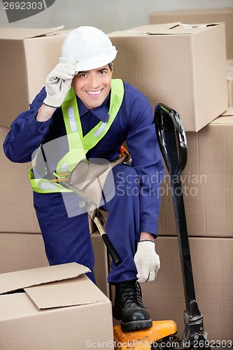 Image of Foreman With Fork Pallet Truck At Warehouse