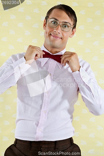 Image of Geek Adjusting Bowtie