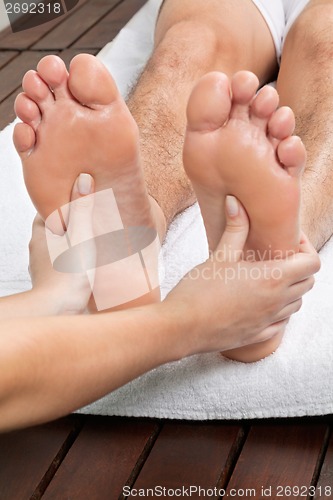 Image of Man Receiving Foot Massage