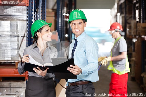 Image of Supervisors And Foreman Working At Warehouse