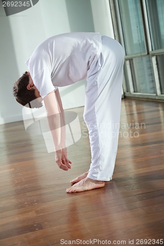 Image of Man Practicing Yoga Exercise