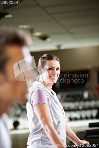 Image of Woman Working Out At Health Club