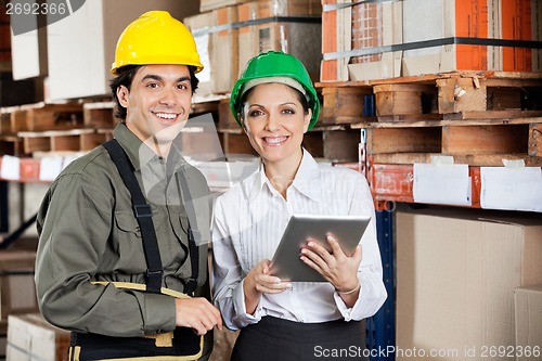 Image of Supervisor Instructing Foreman At Warehouse