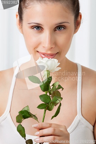 Image of Beautiful Woman Holding White Rose