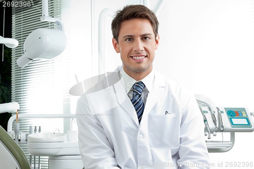 Image of Happy Male Dentist In Clinic