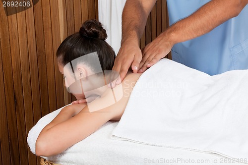 Image of Woman Receiving a Back Massage