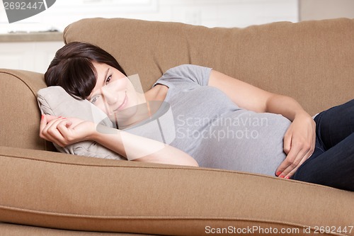 Image of Pregnant Woman on Couch