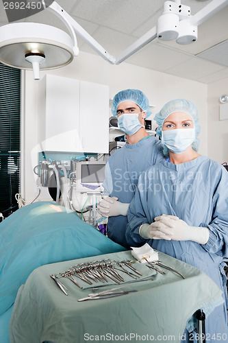 Image of Veterinarian Surgeons In Operating Room