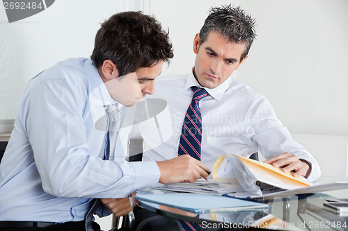 Image of Businessmen Working In Office