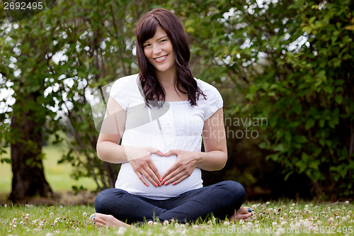 Image of Portrait of Happy Pregnant Woman