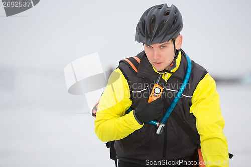 Image of Young Courier Delivery Man Using Walkie-Talkie