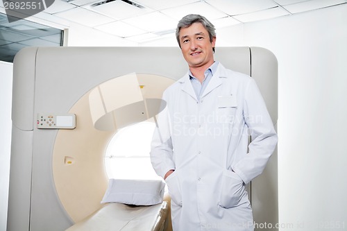 Image of Doctor Standing With Hands In Pockets