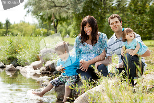 Image of Family Portrait Near Lake