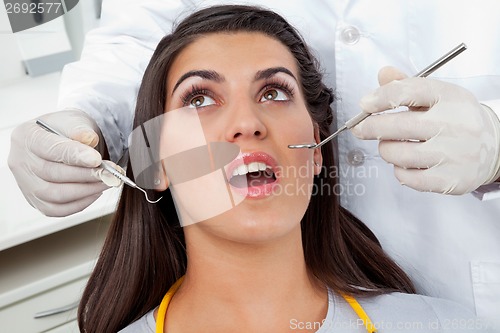 Image of Patient Having Her Teeth Examined