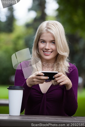 Image of Happy Woman with Mobile Phone