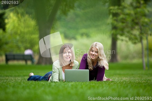 Image of Women Using Laptop In Park