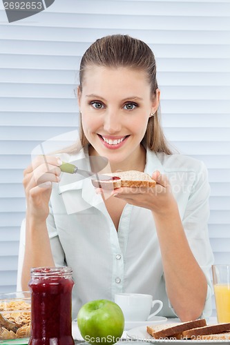 Image of Businesswoman Having Healthy Breakfast