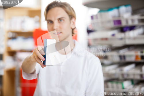 Image of Pharmacist Holding Medicine