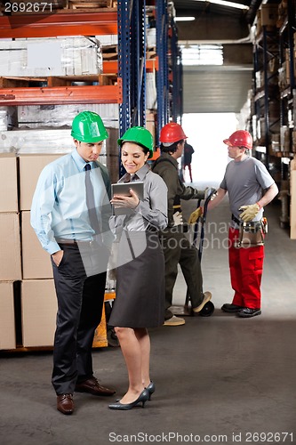 Image of Supervisors With Digital Tablet Working At Warehouse