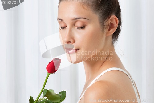 Image of Woman With Red Rose