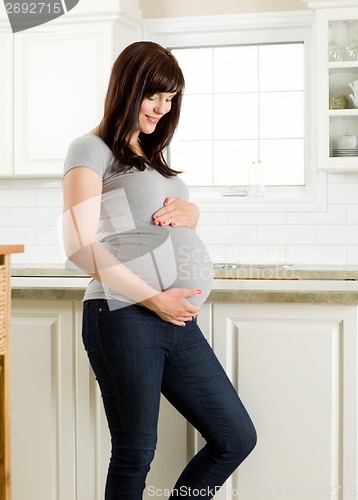 Image of Healthy Pregnant Mother in Kitchen