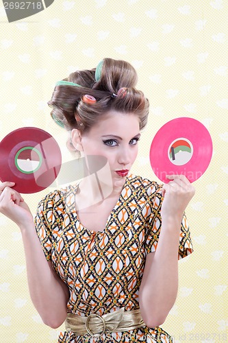 Image of Woman Holding Vinyl Record