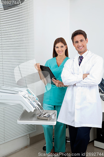 Image of Dentist And Female Assistant In Clinic