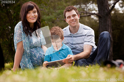 Image of Family Park with Digital Tablet