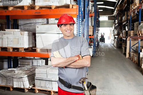 Image of Mid Adult Foreman With Arms Crossed At Warehouse