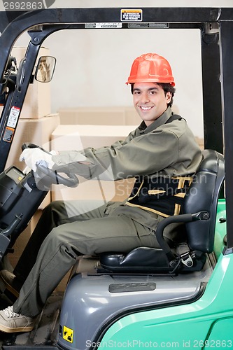 Image of Portrait Of A Confident Forklift Driver