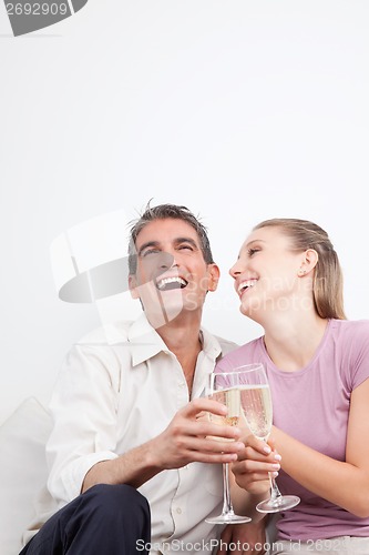 Image of Happy Couple with Champagne Flutes