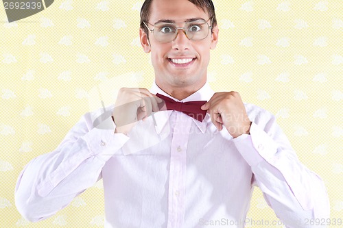 Image of Geek Adjusting Bow Tie