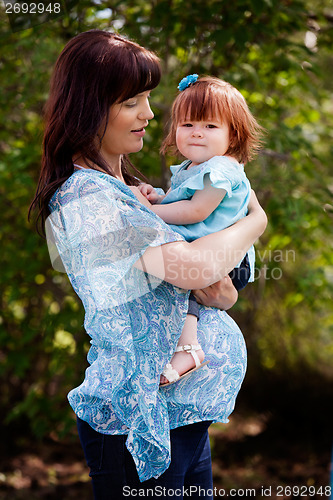 Image of Pregnant Mother with Daughter