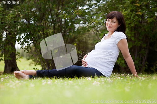 Image of Pregnant Woman in Park