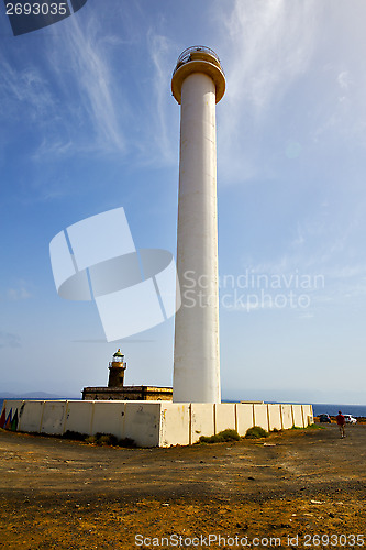 Image of lanzarote lighthouse and rock in the blue sky     teguise  