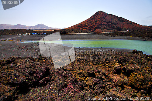 Image of car street people  stone  atlantic ocean sky   pond rock  coastl