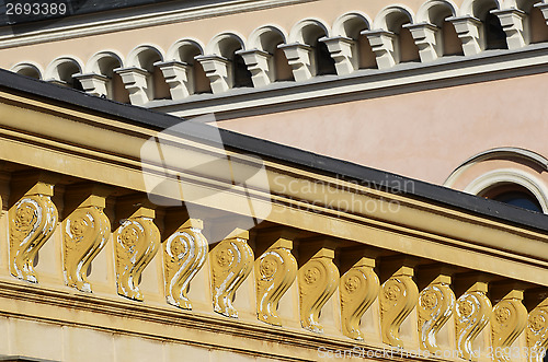 Image of architectural details, cornices and windows