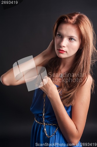 Image of beautiful young red haired woman