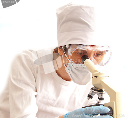 Image of clinician studying new medicine