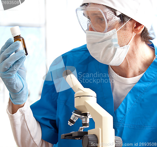 Image of clinician studying new medicine