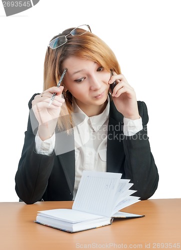 Image of Beautiful business lady in office