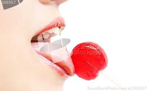 Image of lips, tongue and candy