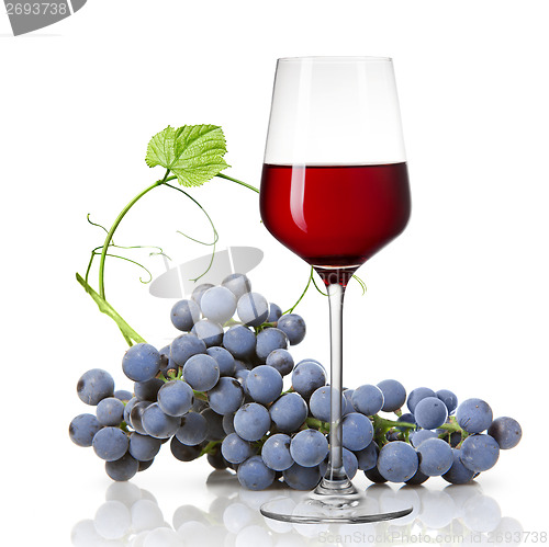 Image of Glass of red wine and grape isolated on white