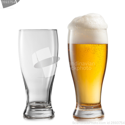 Image of Empty and full glasses of beer isolated on white background