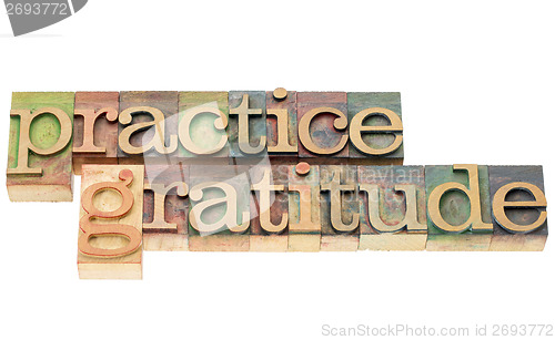 Image of practice gratitude in wood type