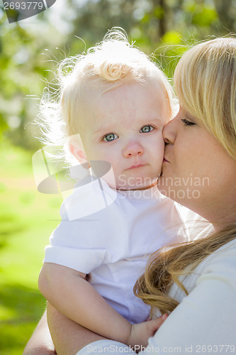 Image of Young Mother Holding Her Adorable Baby Boy