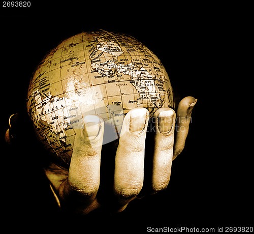 Image of Globe in a girl's hands